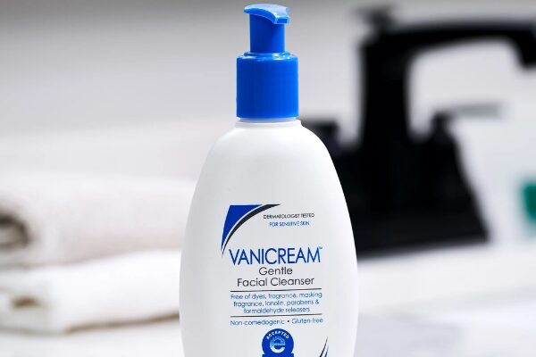 A bottle of Vanicream Gentle Facial Cleanser with a blue pump sits on a bathroom countertop, featuring a clean, minimalist design. The label highlights its dermatologist-tested, fragrance-free, and non-comedogenic formula, making it suitable for sensitive skin. | Is Vanicream Cleanser good for skin?